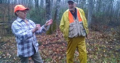 Cheryl Adams (UPM-Blandin) discusses an idea with Jack Rajala during a November 2015 field tour at Sugar Hills. 